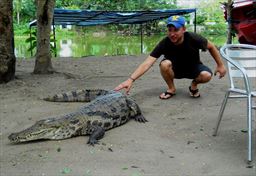 Guest with crocodile in Ghana